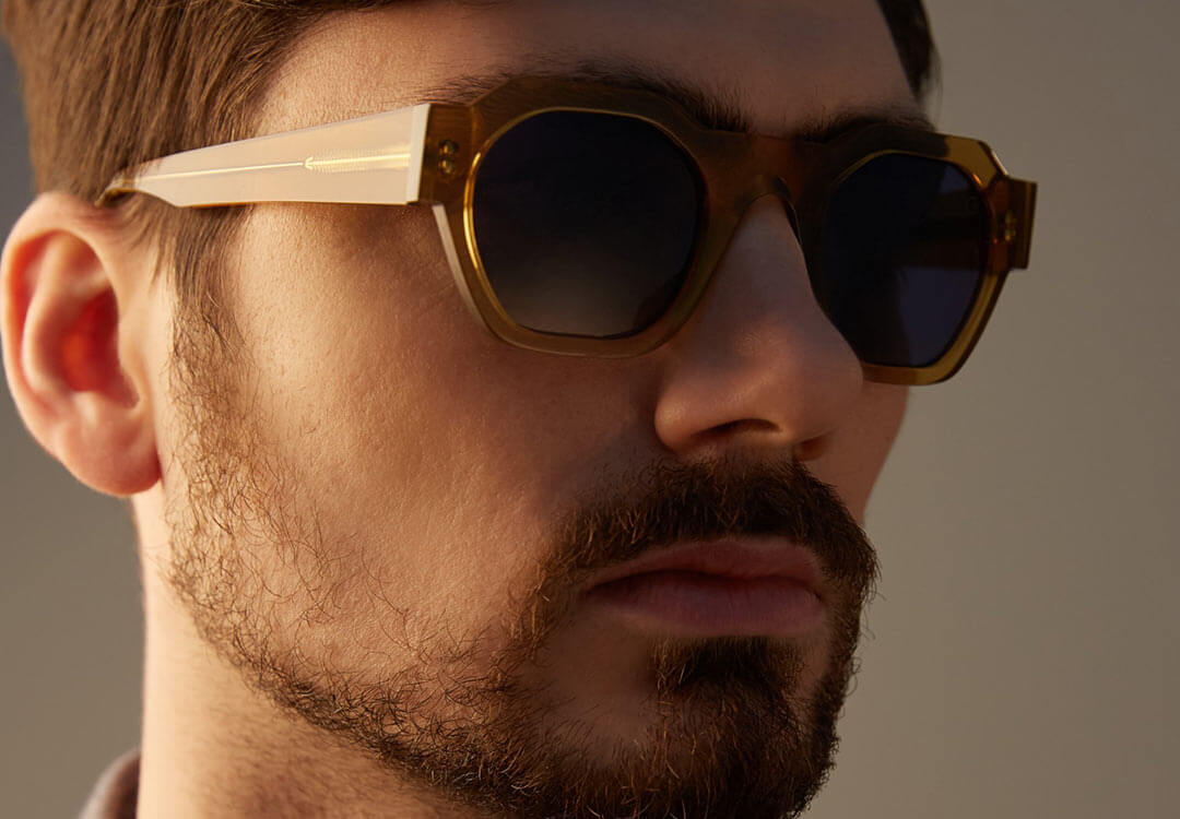 Male model wearing modern chunky glasses frames by Giorgio Nannini.
