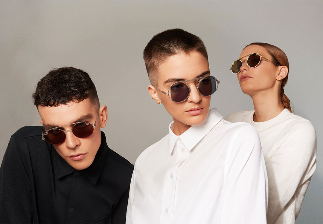 Three people wearing black and white and modelling designer miga studio eyewear.